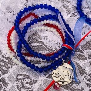“Mafia Up!’ Buffalo Bills stretch bracelets with Buffalo charm.